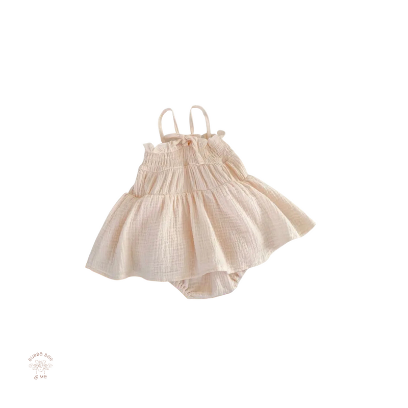Baby girl romper,ruffle skirt, shoulder straps butter milk colour, Bubba Bee & Me.
